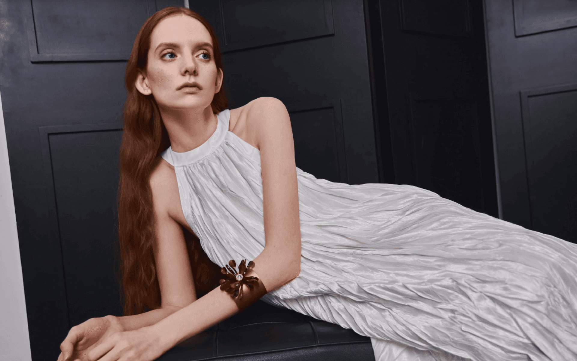 Elegant woman in silk dress showcasing JIHOO's premium silk products